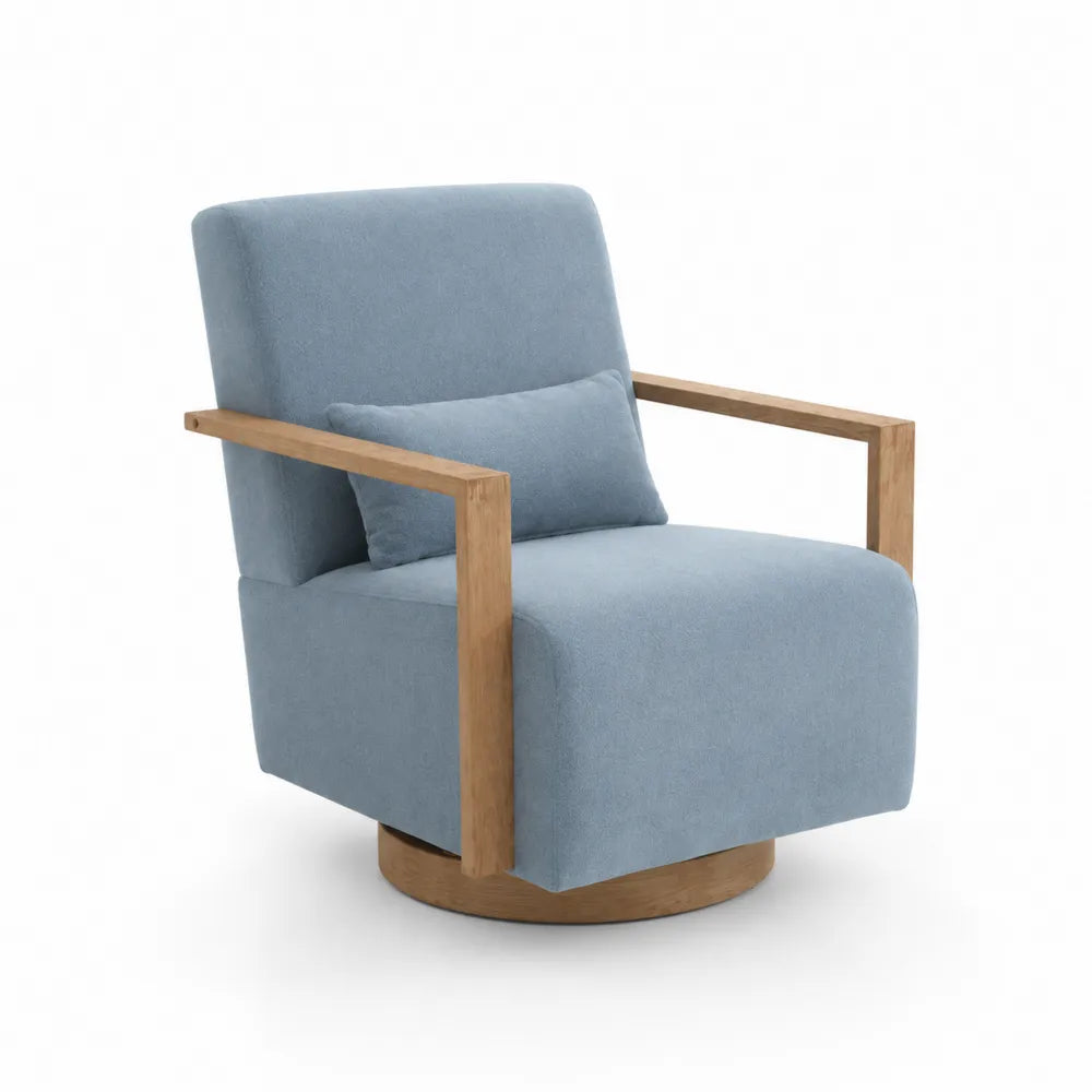 Drehbarer Sessel mit blauer Stoffpolsterung und